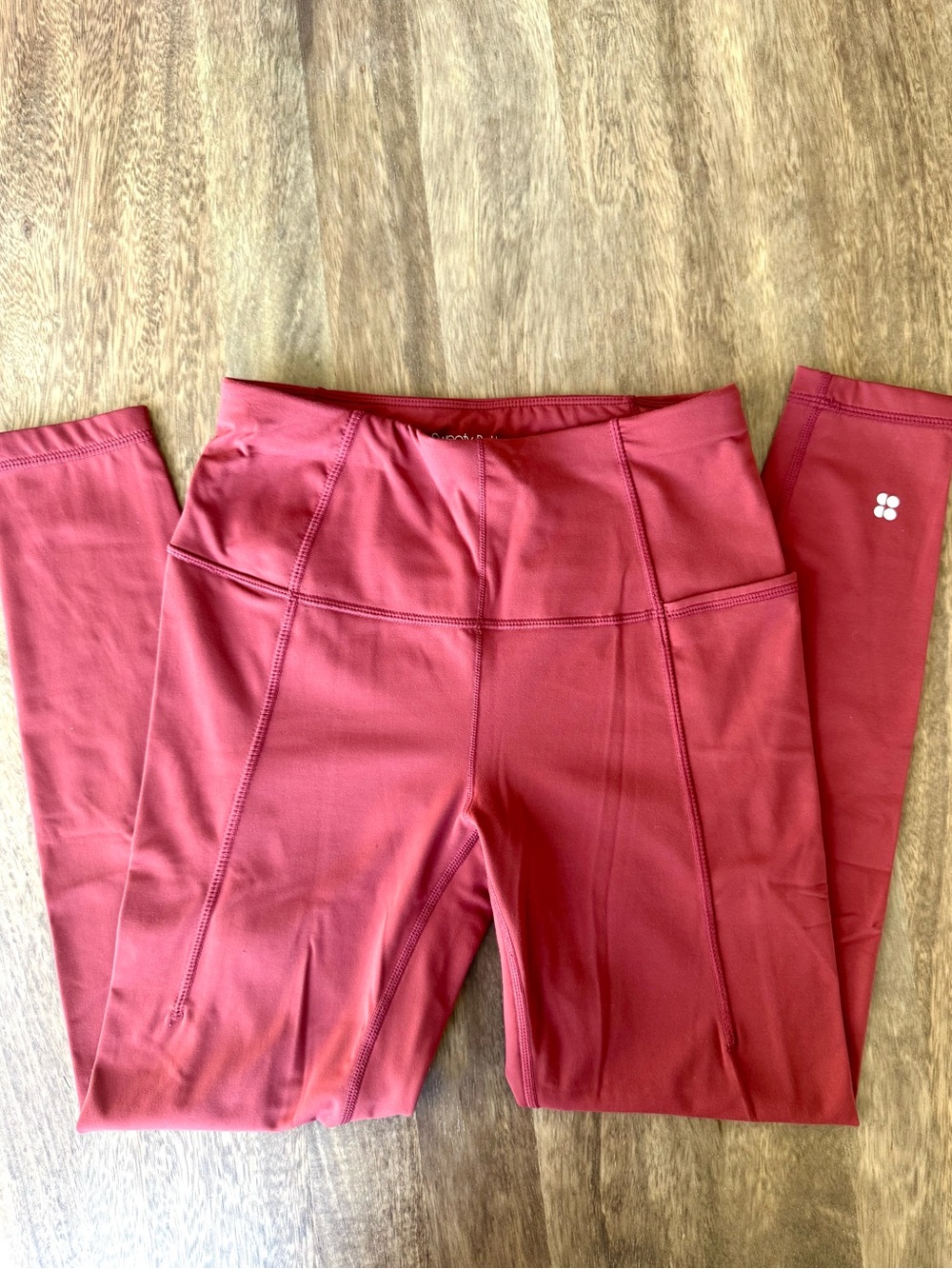 Sweaty bun super soft, 7/8 yoga legging, in a rich red women’s size XS